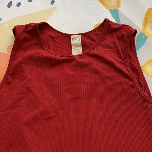 2 parallel tanks-Selling as not worn in quite some time. - Picture 2 of 3